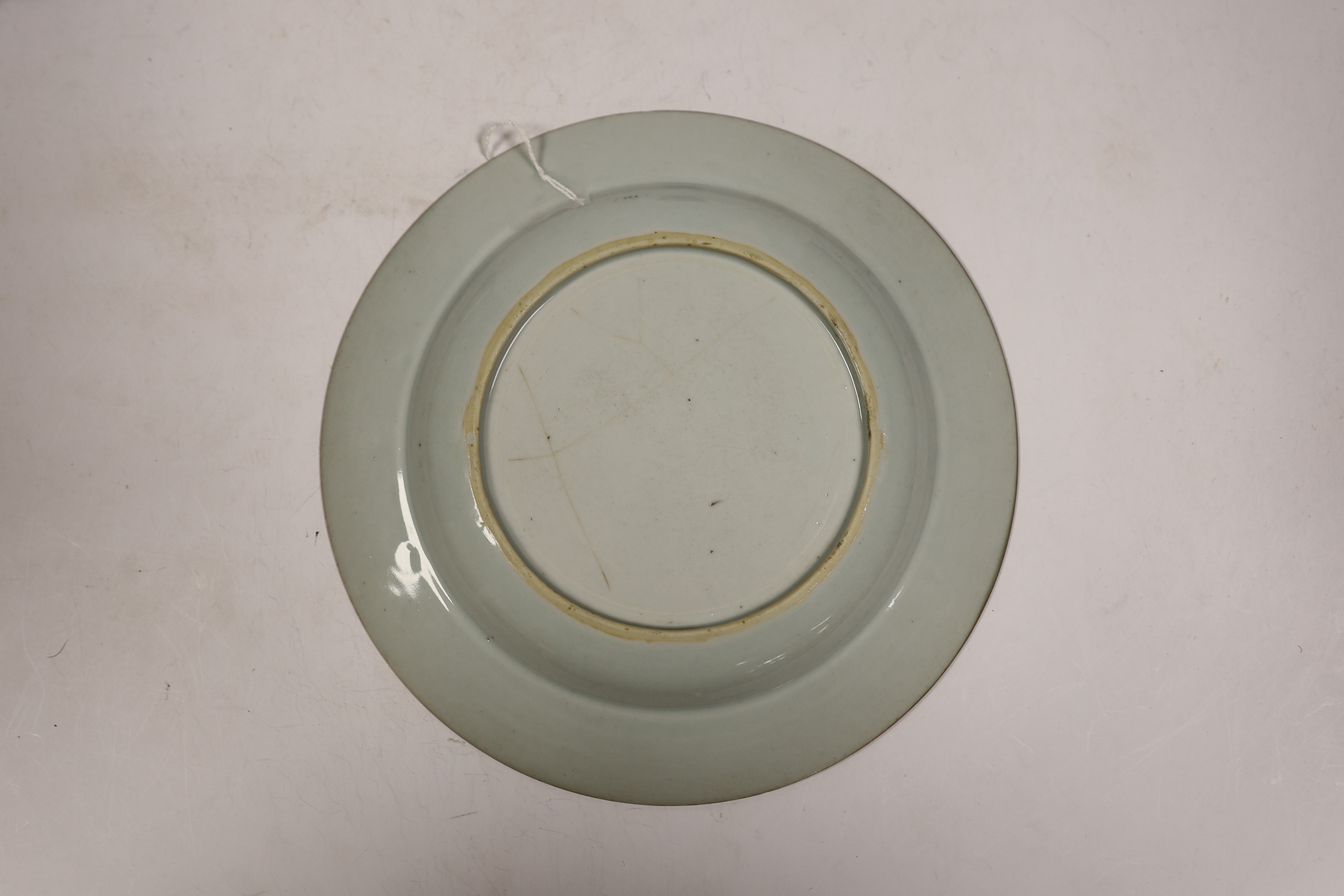A Chinese bianco sopra bianco plate, diameter 23cm, and two blue and white small pots
